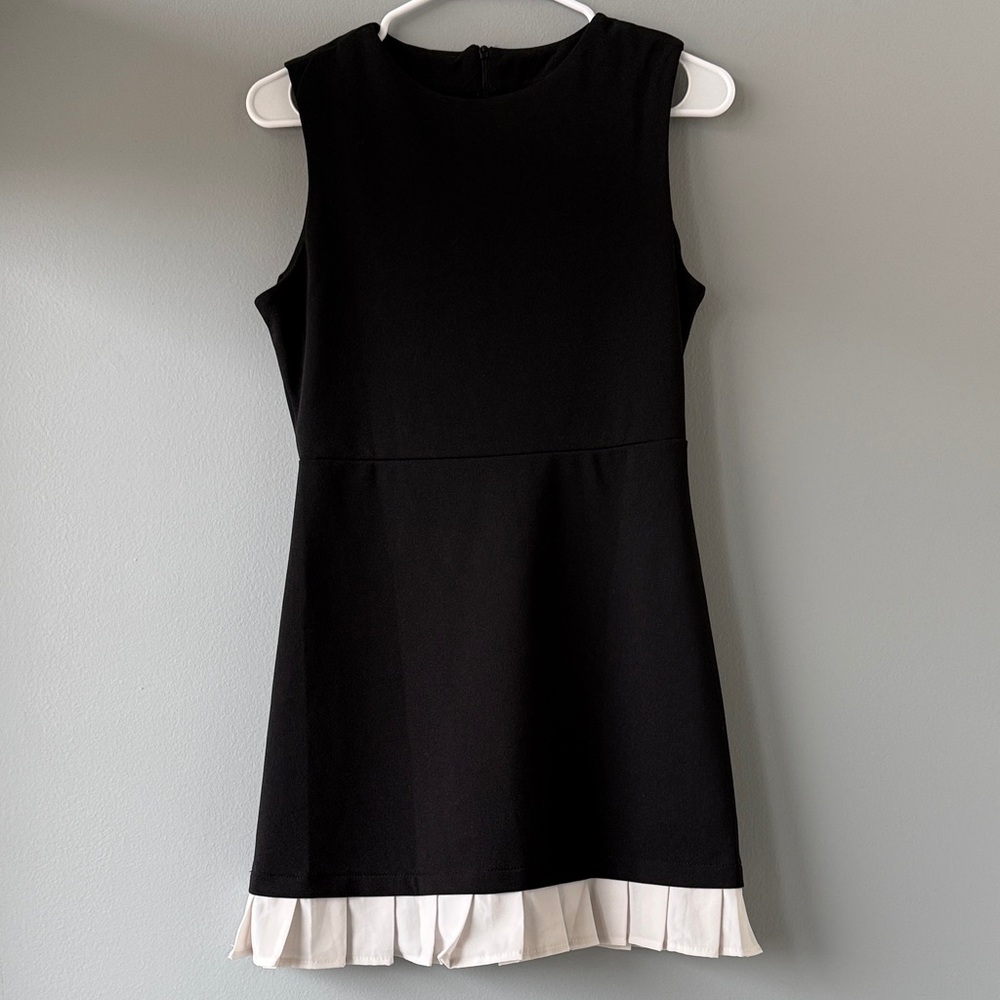 Black Sleeveless Dress with White Pleated Hem